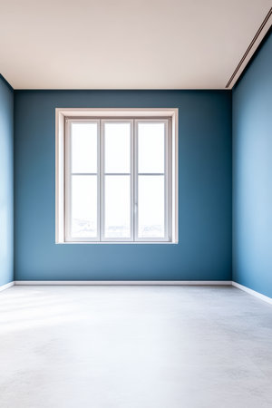 Spacious room features blue walls and a large window that allows sunlight to flood in. The minimalist design emphasizes the openness and tranquility of the space.の素材