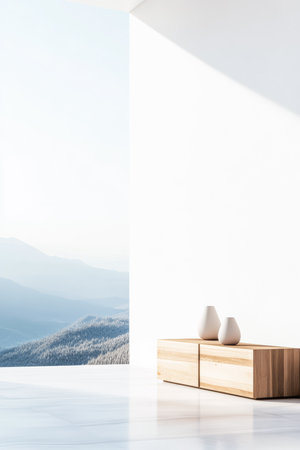 A clean, bright room features a stylish wooden cabinet with two vases, overlooking stunning mountains under a clear sky. Natural light fills the space, creating a serene atmosphere.の素材