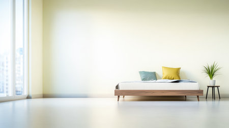 In a bright and airy bedroom, a low wooden bed with soft pillows rests against a yellow wall. A small plant and a side table add a touch of life to the serene space.の素材