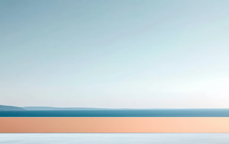 A peaceful coastal scene captures a vast sea meeting a pastel-colored horizon. The clear sky enhances the tranquility of this serene setting, inviting relaxation and contemplation.の素材