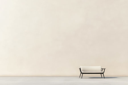A simple, modern bench rests against a smooth, light-colored wall in a spacious room. The setting is bright and airy, perfect for relaxation or contemplation.の素材