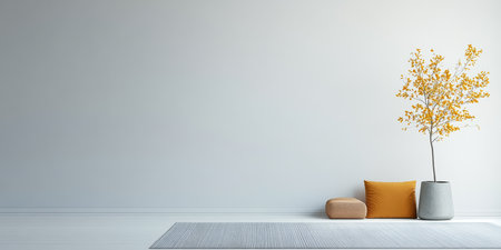 A bright living area showcases a simple design with a yellow tree in a pot, a textured rug, and a cozy pillow on the floor, creating a calm atmosphere.の素材
