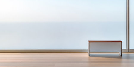 A spacious interior showcases a smooth wooden bench placed beside a large glass window, offering a calm and expansive view of the outdoors. The simple design emphasizes minimalism.の素材