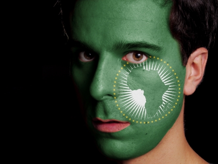 Flag of African Union Painted on a Face of a Young Manの写真素材