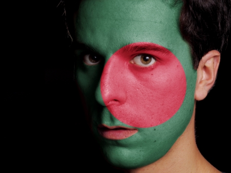 Flag of Bangladesh Painted on a Face of a Young Manの写真素材