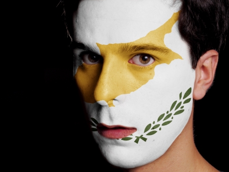 Flag of Cyprus Painted on a Face of a Young Manの写真素材