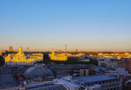 Spain, Madrid, Elevated view of the Cybele Palace at sunset.のeditorial素材
