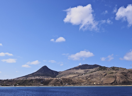 Portugal, Madeira Islands, View towards the coast of the Porto Santo Island.の写真素材