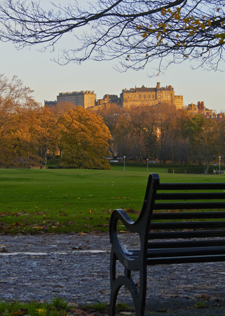 UK, Scotland, Lothian, Edinburgh, View of the Edinburgh Castle and The Meadows Park illuminated by the sunrise.のeditorial素材