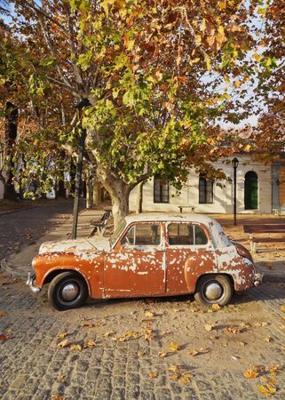 Uruguay, Colonia Department, Colonia del Sacramento, Vintage car on the cobblestone lane of the historic quarter.のeditorial素材
