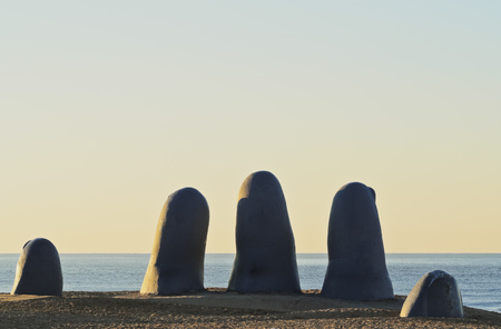 Uruguay, Maldonado Department, Punta del Este, Playa Brava, La Mano(The Hand), a sculpture by Chilean artist Mario Irarrazabal.の写真素材