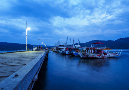Brazil, State of Rio de Janeiro, Twilight view of the boats in Paraty.の写真素材