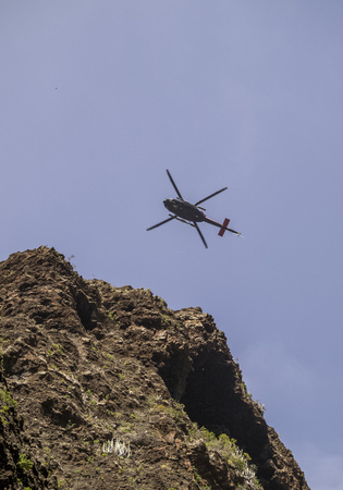 Rescue Helicopter over Barranco de Masca, gorge, Teno Massif, Tenerife Island, Canary Islands, Spainの写真素材