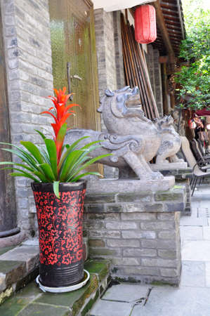 Chinese decor, Chengdu. Decorating the outside of a traditional building on an historical street, a mixture of natural & man-made objects here in Cheng Du, Chinaの写真素材