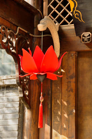 Chinese decor, Chengdu. Decorating the outside of a traditional building on an historical street, a mixture of natural & man-made objects here in Cheng Du, Chinaの写真素材