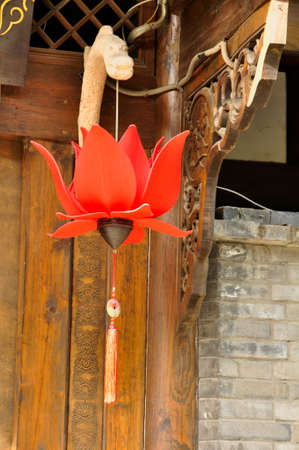 Chinese decor, Chengdu. Decorating the outside of a traditional building on an historical street, a mixture of natural & man-made objects here in Cheng Du, Chinaの写真素材