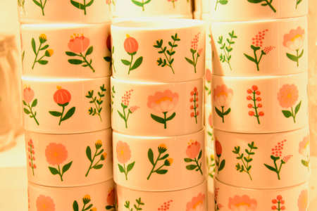 Colours and patterns on paper, metal, wax, glass, fabric, etc. decorate everyday objects, Englandの写真素材