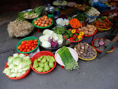 Assorted vegetables. Fresh from the farm, these vegetables are ready to buy on this market in Ho Chi Minh City, Vietnamの写真素材