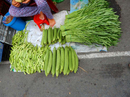 Assorted vegetables. Fresh from the farm, these vegetables are ready to buy on this market in Ho Chi Minh City, Vietnamの写真素材
