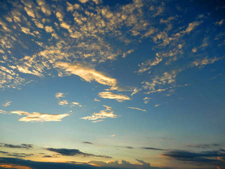 Cloudy skies.  Fluffy white clouds against this blue sky over the river Mekong in Vietnamの写真素材