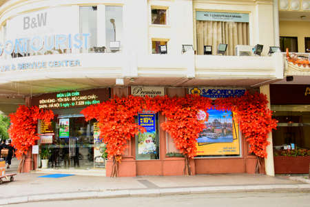 Travel agent. A colourfully decorated Travel Agent in the centre of Ho Chi Minh City, Vietnamのeditorial素材