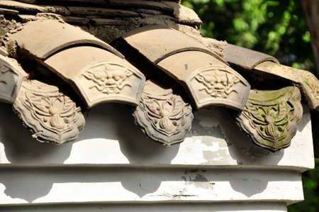 Chinese roof tiles. Adorning a traditionally constructed building here in Cheng Du, China
