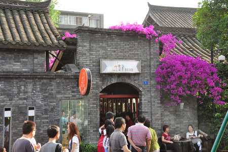 Chinese street scene. A busy street scene in this historical and cultural area of Cheng Du, Chinaのeditorial素材