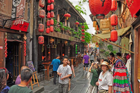 Chinese street scene. A busy street scene in this historical and cultural area of Cheng Du, Chinaのeditorial素材