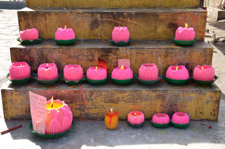 Remembrance  candles. Candles burned at a temple for lost family members here in Georgetown, Malaysiaの写真素材