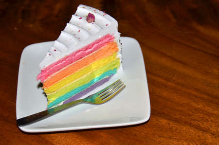 Rainbow cake. A colourful gastronomic creation served here in this restaurant in Georgetown,...