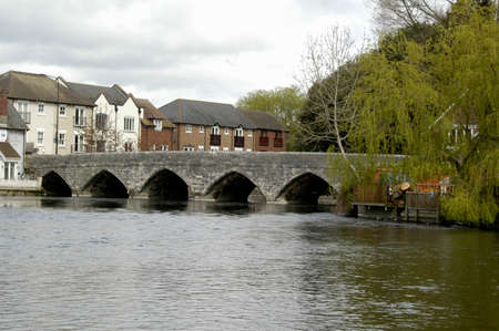 Bridge over the Avon, Ringwood, Hampshire. The Southern entrance to the town of Ringwood, Hampshire, Englandの写真素材