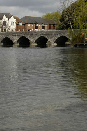 Bridge over the Avon, Ringwood, Hampshire. The Southern entrance to the town of Ringwood, Hampshire, Englandの写真素材
