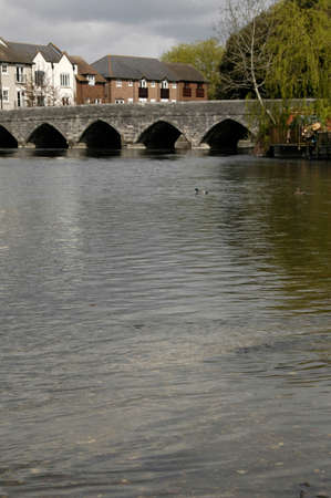 Bridge over the Avon, Ringwood, Hampshire. The Southern entrance to the town of Ringwood, Hampshire, Englandの写真素材