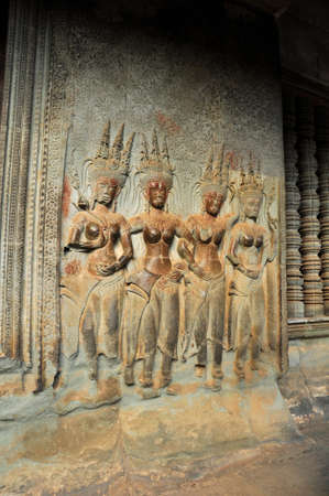 Carvings. One of many sculptured works dotted around the vast Angkor complex, centuries old, here in Cambodiaのeditorial素材