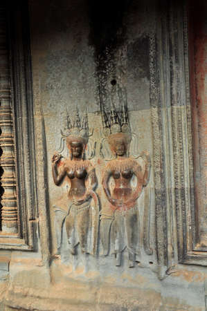 Carvings. One of many sculptured works dotted around the vast Angkor complex, centuries old, here in Cambodiaのeditorial素材