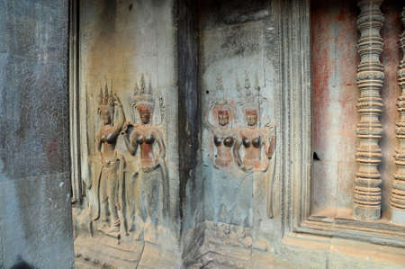 Carvings. One of many sculptured works dotted around the vast Angkor complex, centuries old, here in Cambodiaのeditorial素材