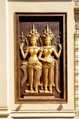 Carvings. One of many sculptured works dotted around the vast Angkor complex, centuries old, here in Cambodiaの写真素材
