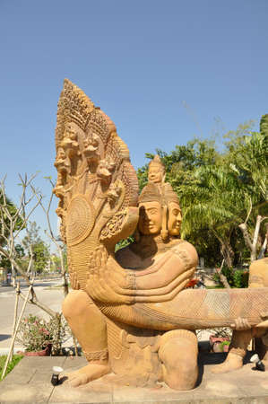 A Naga in Siem Reap. A Naga is a mythical semi divine being, half human and half cobra in the religions of Buddhism, Hinduism and Jainismの写真素材