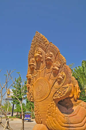 A Naga in Siem Reap. A Naga is a mythical semi divine being, half human and half cobra in the religions of Buddhism, Hinduism and Jainismの写真素材