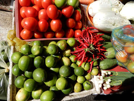 Vegetables.  Produce on display and for sale on this fruits and vegetable market in Pnom Penn, Cambodiaの写真素材