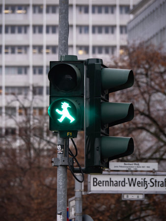 Green traffic light on a street in the city of Berlin, Germany.の写真素材