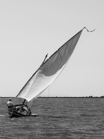 sailing boat on the sea, black and white photo with copy space