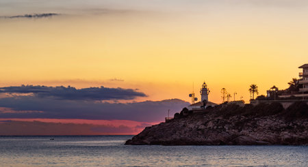Lighthouse on the coast of Costa Brava at sunset, Catalonia, Spain