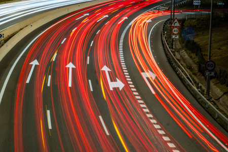 lights of moving cars with night. long exposure red and orange.
