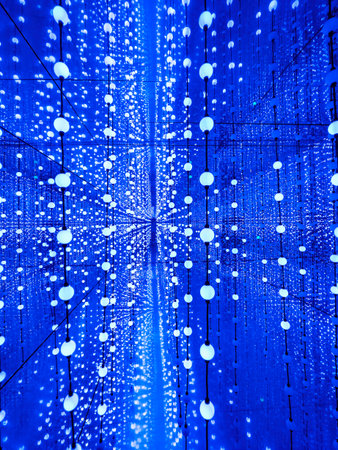 abstract blue bokeh background of Christmas lights on a blue background