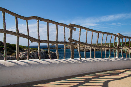 Wooden stairs to the sea on a background of blue sky.の写真素材