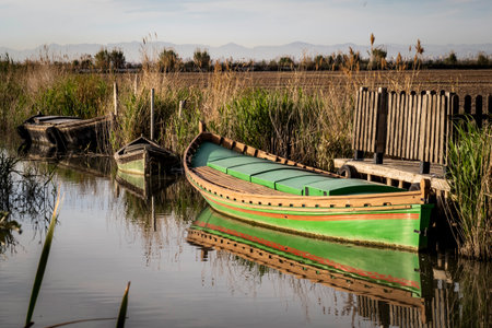 Fishing boats on the lake at sunset. Lake Titicaca, Boliviaの写真素材