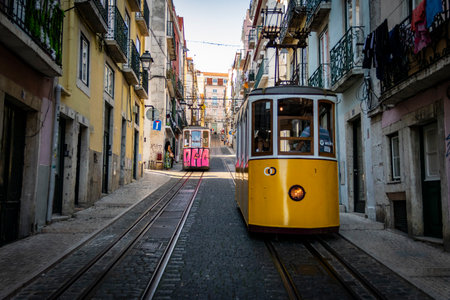 Old yellow tram in the city of Lisbon, Portugal.
