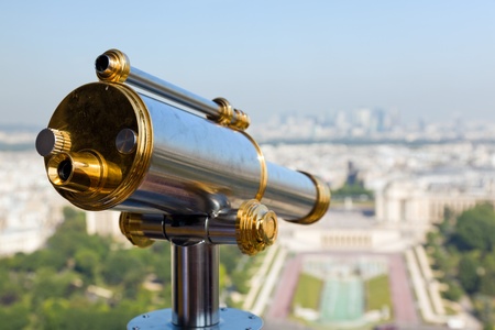 View of a telescope from high up on the Eiffel Tower 