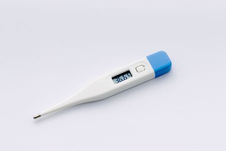 Digital Thermometer showing body temperature in degree celsiusの写真素材